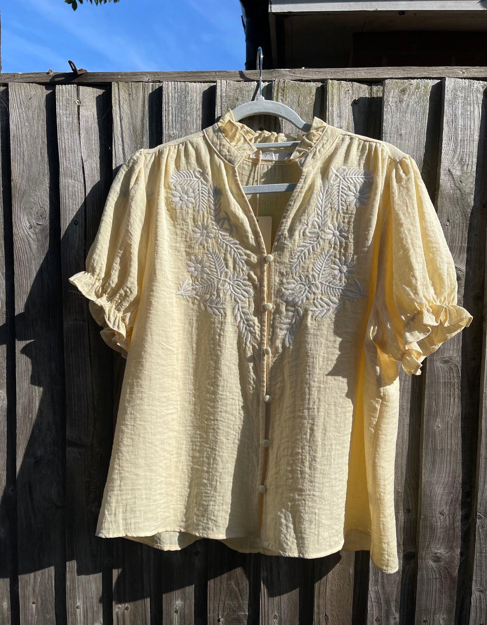 Buttermilk embroidered cropped sleeve shirt