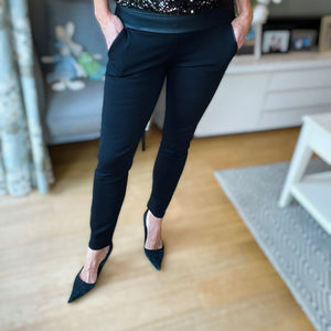 Black leather detailed trousers