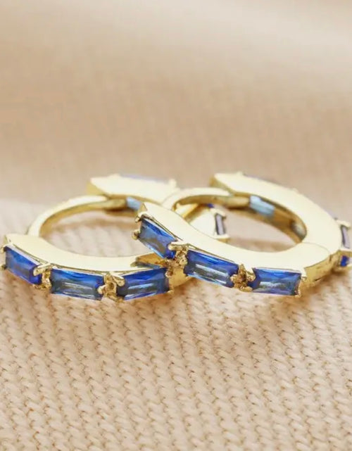 Load image into Gallery viewer, Blue Baguette Crystal Huggie Hoop Earrings
